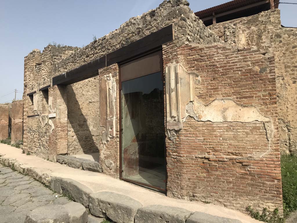 VII.2.44, centre left, and VII.2.45, centre right, Pompeii. April 2019. 
Looking west along front façade on Via degli Augustali, from near VII.2.45.  Photo courtesy of Rick Bauer.