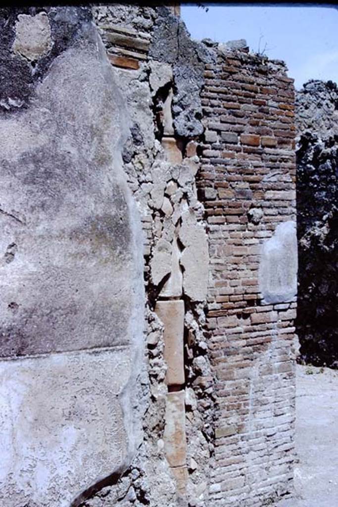 VII.2.51 Pompeii. 1966. Waste down-pipe in exterior wall between VII.2.51 and 52.
Photo by Stanley A. Jashemski.
Source: The Wilhelmina and Stanley A. Jashemski archive in the University of Maryland Library, Special Collections (See collection page) and made available under the Creative Commons Attribution-Non Commercial License v.4. See Licence and use details. J66f0477