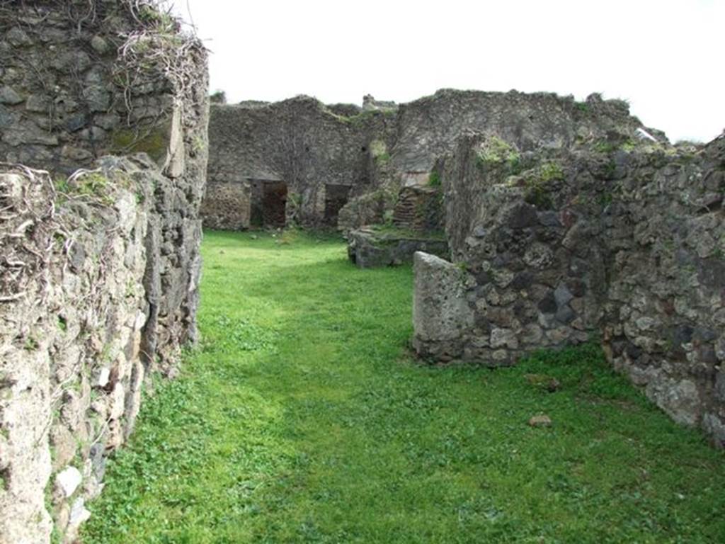 VII.3.4 Pompeii. March 2009.  Corridor room on west side of rear room, leading to a yard or area with oven.