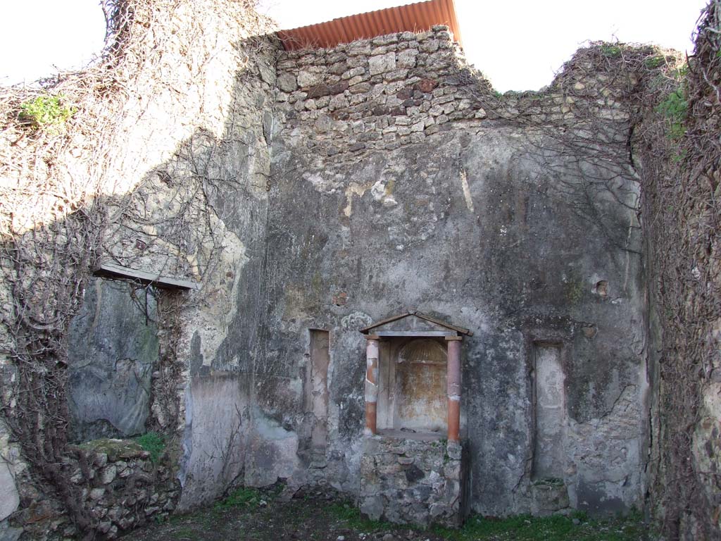 VII.3.6 Pompeii. December 2006. On the left can be seen the window from the triclinium. 
The aedicula lararium is against the south wall of the garden.
According to Fiorelli, eight fugitives perished and were found in the triclinium.