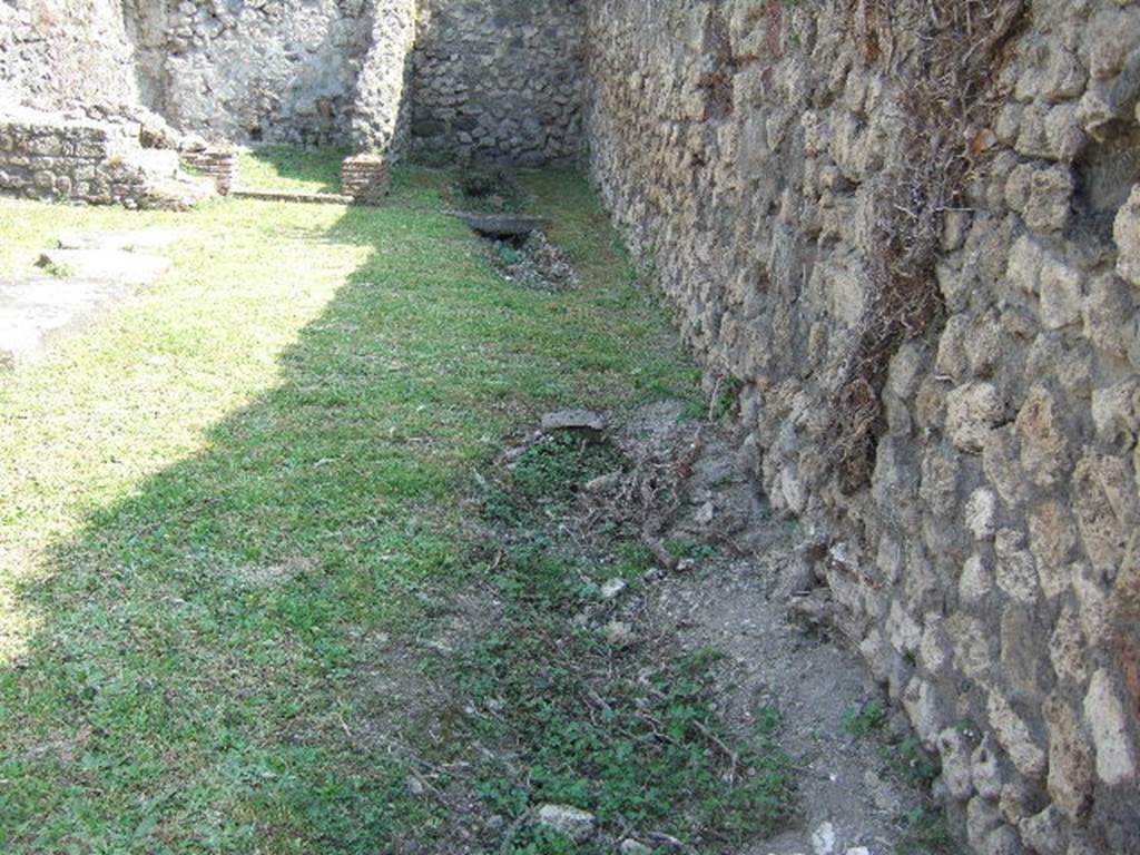 VII.3.10 Pompeii. May 2006. Looking south across shop to latrine, at rear on right.