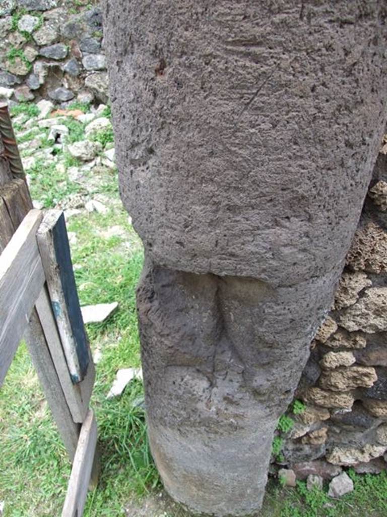 VII.3.11 Pompeii.  March 2009. South west side of corridor. Lower Tufa part of column.
