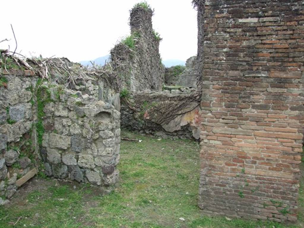 VII.3.12 Pompeii.  March 2009. Doorway to rear room of shop.