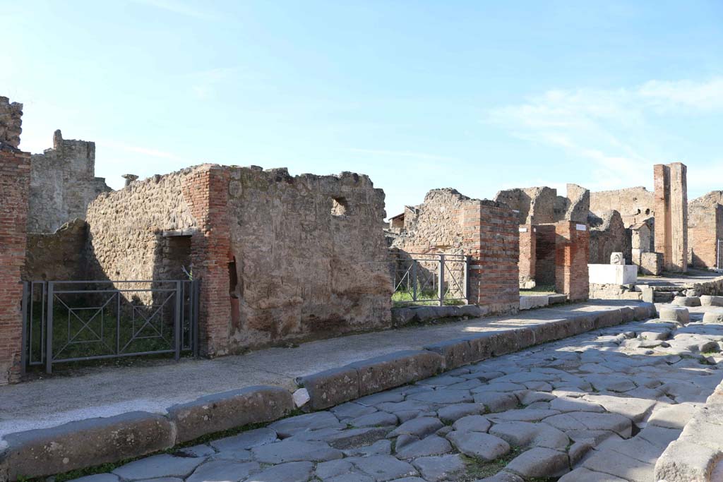 VII.3.17, Pompeii, on left. December 2018. 
Looking west on Via Stabiana towards entrances of VII.3.17, VII.3.16, centre, and VII.3.15, on right. Photo courtesy of Aude Durand.