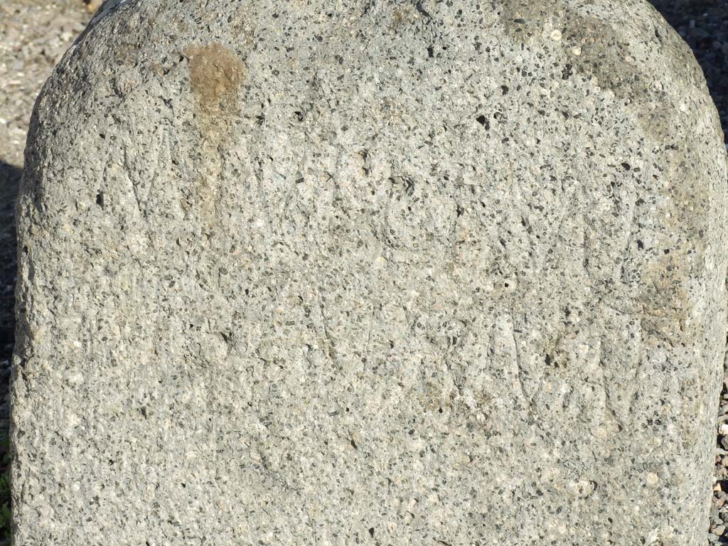 VII.4.2 Pompeii. December 2007. 
Boundary marker made of volcanic tufa between Temple of Fortuna Augusta and the Area Privata of M. Tullius.
Inscription on front says, “Private land of Marcus Tullius, son of Marcus”.