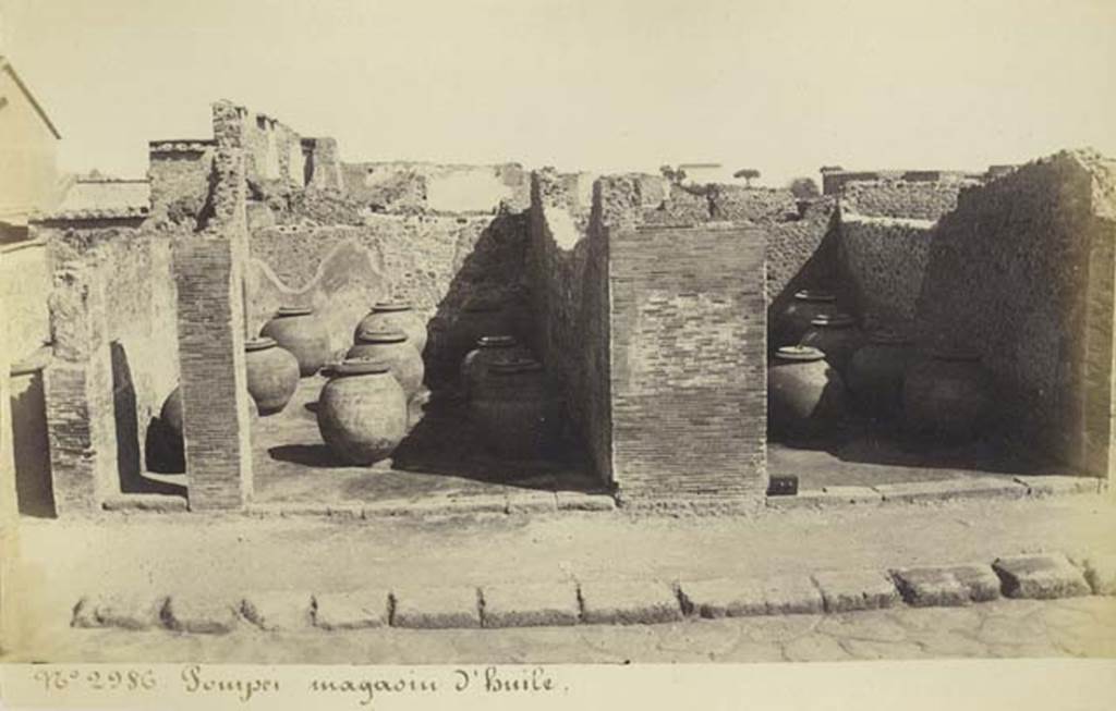VII.4.13 Pompeii and VII.4.14. Old undated photograph by Amodio, numbered 2986, in an album dated c.1873.  Looking east across Via del Foro. Photo courtesy of Rick Bauer.