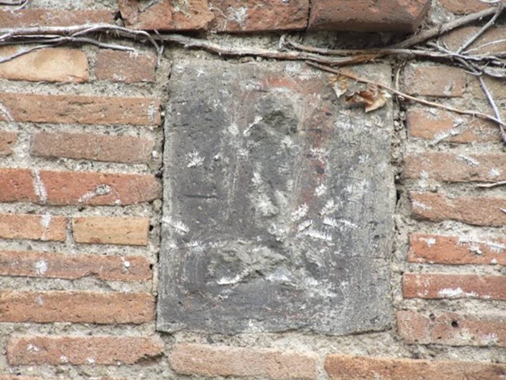 VII.4.27 Pompeii. December 2007. Detail of Phallus plaque.