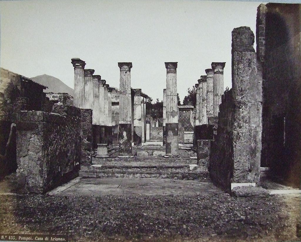 VII.4.31/51 Pompeii. Casa di Arianna. Tablinum and peristyle from atrium. 
Old 19th century photograph, number 435, by Roberto Rive. Courtesy of Society of Antiquaries. Fox Collection.
The arca base block is shown in this photograph, on the right-hand side, at the base of the wall.