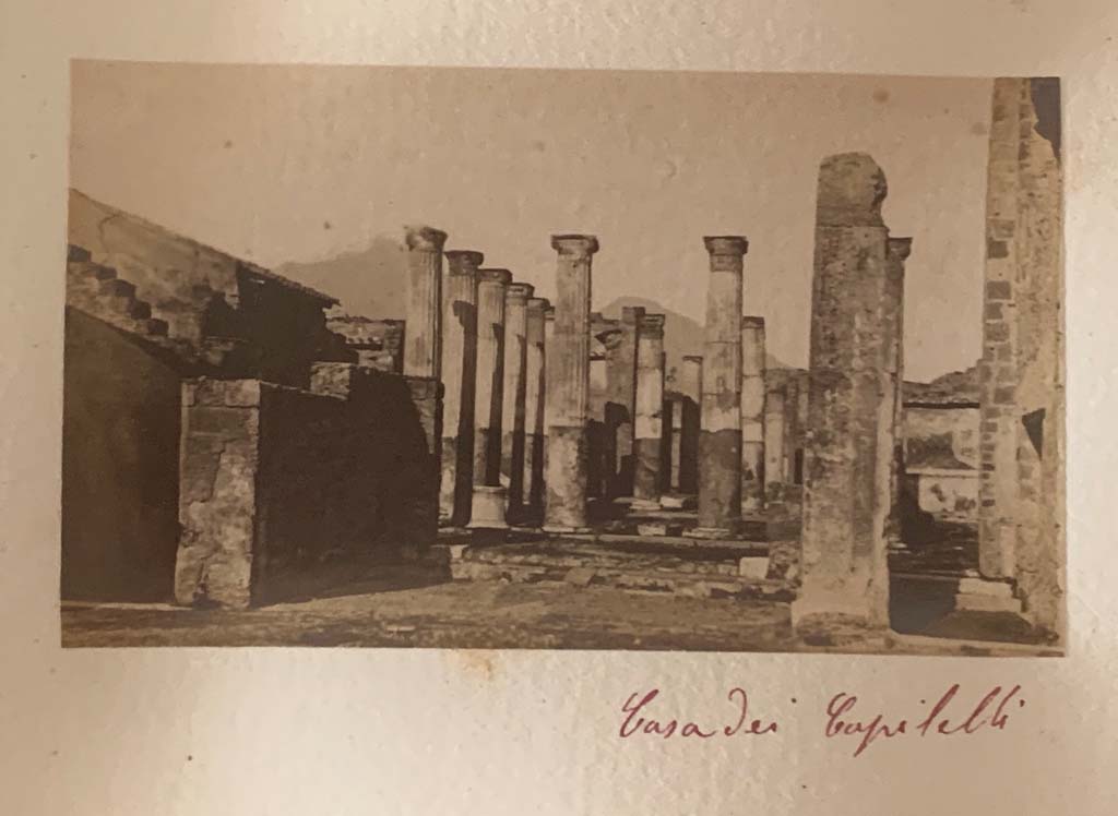 VII.4.31 Pompeii. From an album dated c.1875-1885. Looking towards tablinum and peristyle from atrium.
Photo courtesy of Rick Bauer.