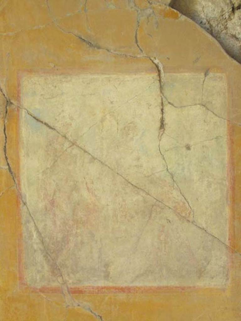 VII.4.31/51 Pompeii. May 2012.  Room 12, oecus.  Remains of very faded wall painting on east wall. A seated Ciparissus is on the right with a stag by his side, and Apollo standing on the left. Photo courtesy of Marina Fuxa.