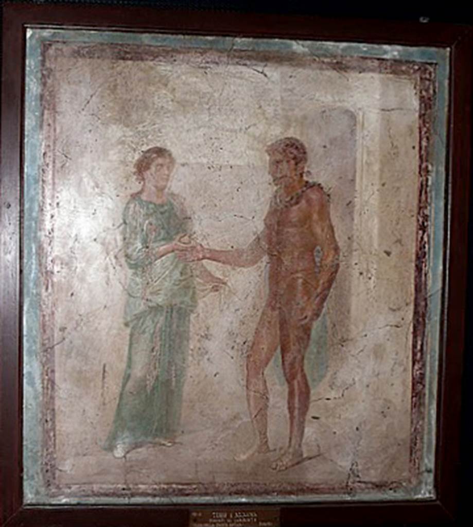 VII.4.48 Pompeii. Room 11, east wall of tablinum.
Painting of Ariadne giving Theseus the ball of string that will guide him out of the labyrinth.
Now in Naples Archaeological Museum. Inventory number 9048.
Helbig describes:
Theseus receiving the ball of yarn from and Ariadne: Theseus stands with blue chlamys, a sword (harpe) in the left hand, and stretches out the right to Ariadne, who hands him the ball of yarn. 
She is standing in front of him in grey shoes and a green chiton cloak, holding a corner of her white cloak with her left hand. 
Behind Theseus is the gate of the labyrinth.
See Helbig, W., 1868. Wandgemälde der vom Vesuv verschütteten Städte Campaniens. Leipzig: Breitkopf und Härtel, p. 253, 1211.