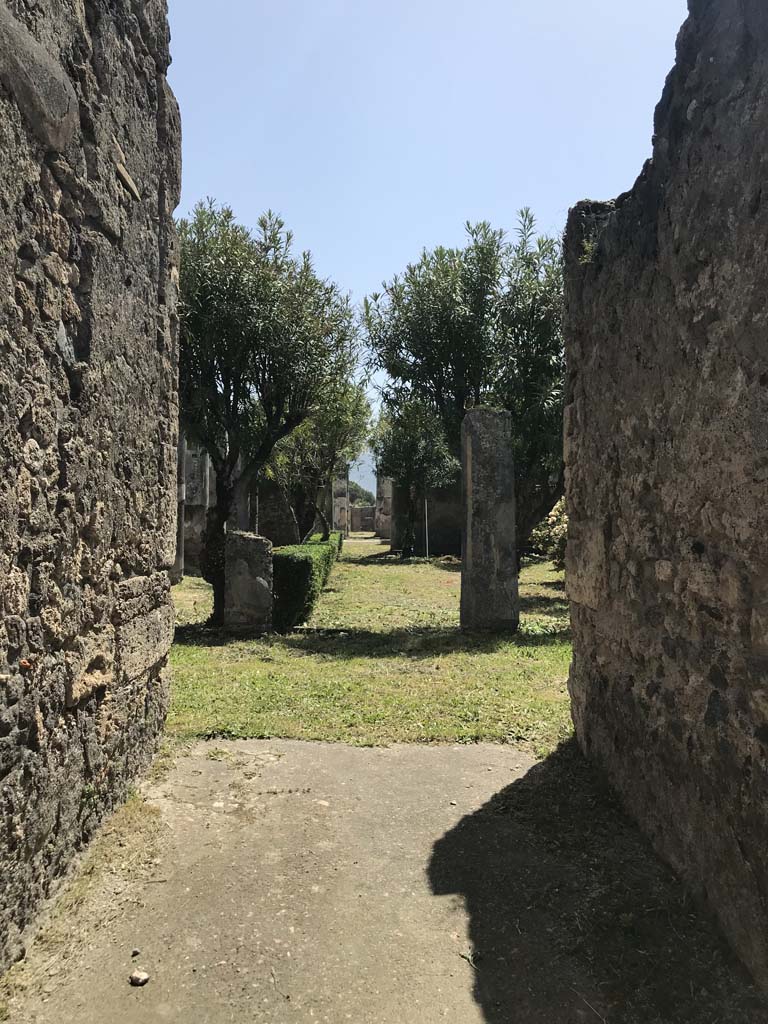 VII.4.31/51 Pompeii. April 2019. 
Looking south from rear entrance doorway on Via della Fortuna. Photo courtesy of Rick Bauer.
(Note: other photos of the third (north) peristyle near to VII.4.51, can also be seen in VII.4.31, pt.15).