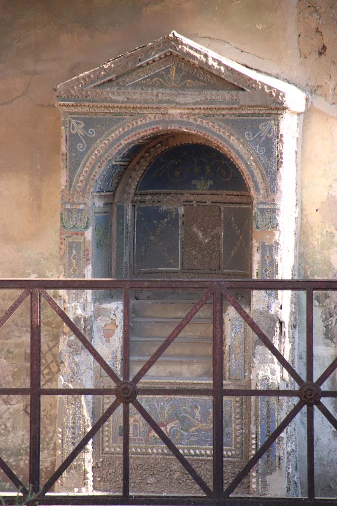 VII.4.56 Pompeii. September 2021. 
Looking south to fountain on rear wall of garden area. Photo courtesy of Klaus Heese.