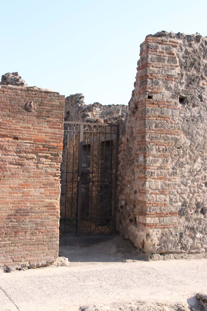 VII.4.56 Pompeii. September 2021. 
Looking south to entrance doorway on Via della Fortuna. Photo courtesy of Klaus Heese.