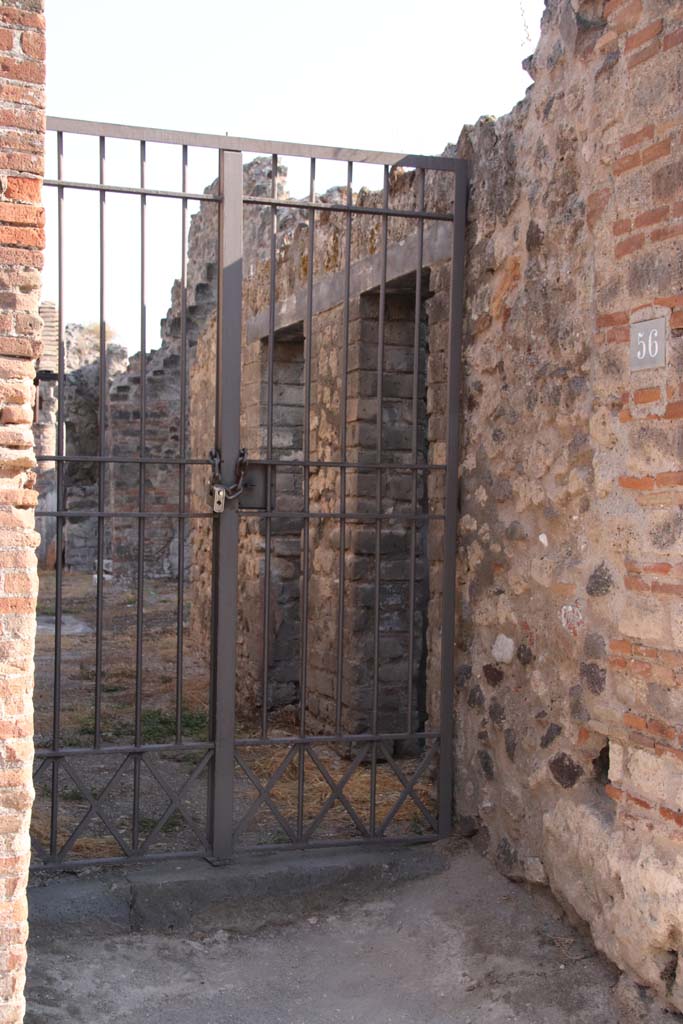 VII.4.56 Pompeii. September 2021. 
Looking south to entrance corridor with two doorways, rooms 2 and 3, on west side. 
Photo courtesy of Klaus Heese.