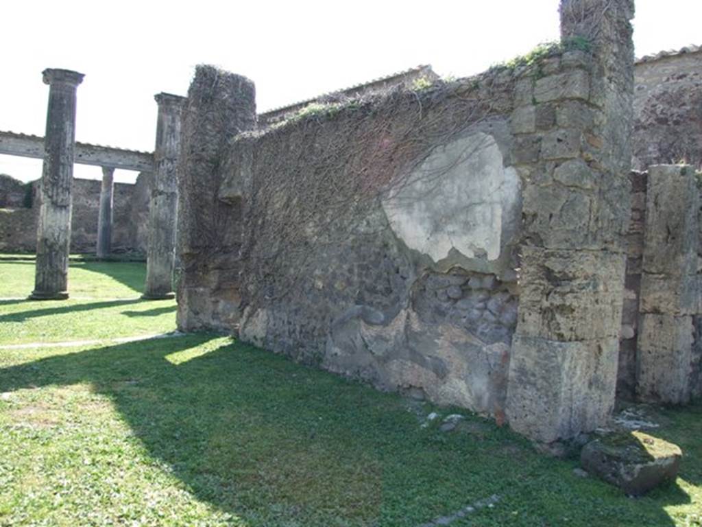VII.4.57 Pompeii. March 2009. Room 7, west wall of tablinum, with lava block for securing the arca, on right.
According to Pagano and Prisciandaro –
9 lug 1832 “Il disterro continua nella casa a destra la strada della Fortuna…… si è disterrato in pie dello staffio destro dal tablino, in testa all’ atrio, un’antica cassa sfasciata ed ossidata di legno, ferro e bronzo, con tre quadretti di bronzo figurati in bassorilievi -
due centauri (NAP 72822, 72824) (RMB 9, pl.58) e tre figure umane (NAP 72823) (RMB 9, pl.59).”
See Pagano, M. and Prisciandaro, R., 2006. Studio sulle provenienze degli oggetti rinvenuti negli scavi borbonici del regno di Napoli. Naples: Nicola Longobardi, (p.146) & PAH II, 255.
(PPM and Avellino – room p, tablinum).