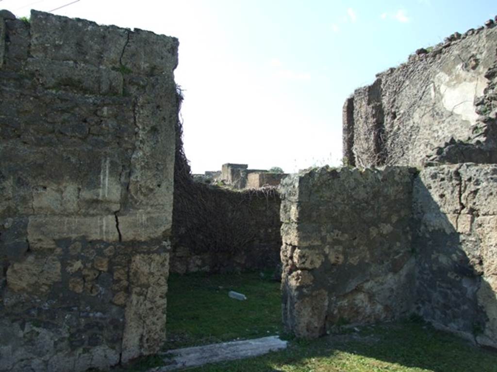 VII.4.57. Pompeii.  March 2009.  Doorway to Room 12. Triclinium.