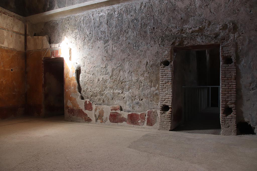VII.5.8 Pompeii. October 2024. 
Tepidarium (49), looking towards north-west corner and north wall, with doorway to Caldarium (50), on right. Photo courtesy of Klaus Heese.