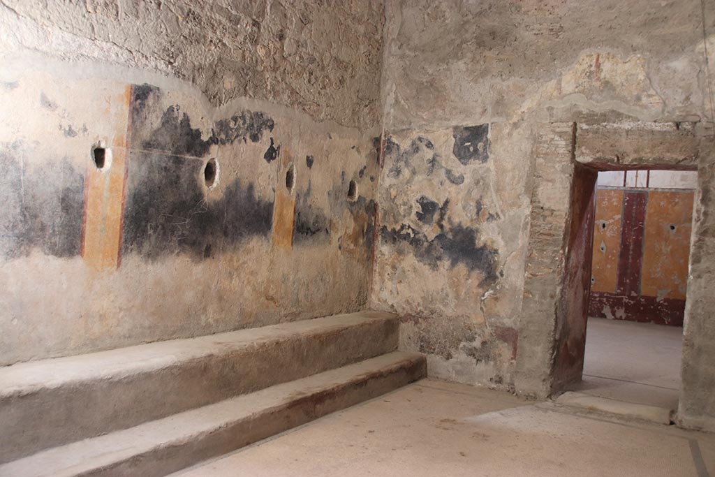 VII.5.8 Pompeii. October 2024. 
Room 46, looking south along east wall towards doorway to Tepidarium 49, on right. Photo courtesy of Klaus Heese.