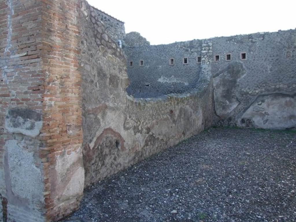 VII.5.22 Pompeii. December 2007. South wall. According to Eschebach, against this wall was a narrow podium containing urns? and a table
See Eschebach, L., 1993. Gebäudeverzeichnis und Stadtplan der antiken Stadt Pompeji. Köln: Böhlau. (p.290)