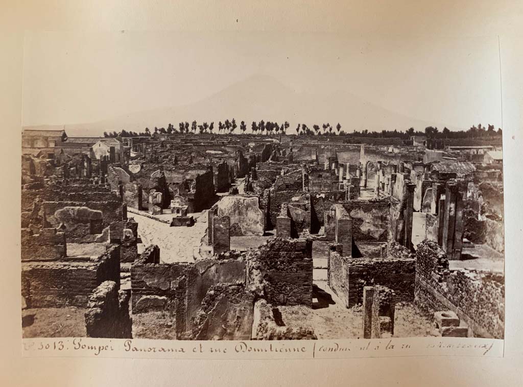 VII.6.11 Pompeii. Photograph by M. Amodio, from an album dated April 1878. 
Looking north across north side of Reg. VII, Ins. 6, the entrance doorway of VII.6.11 can be seen on the lower right.
The entrance doorway to VII.6.7 can be seen on the lower left. Photo courtesy of Rick Bauer.