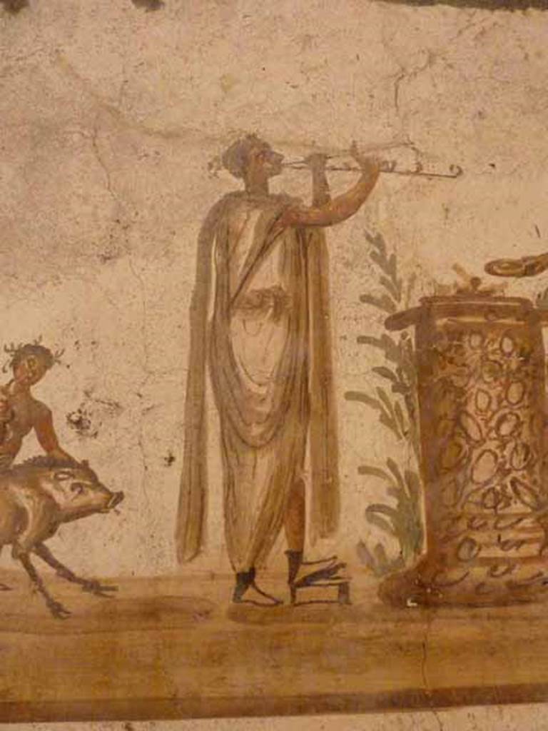 VII.6.38 Pompeii. Detail of the double-flute player or tibicen, shown on lararium painting.  Now in Naples Archaeological Museum. Inventory number: 8905.