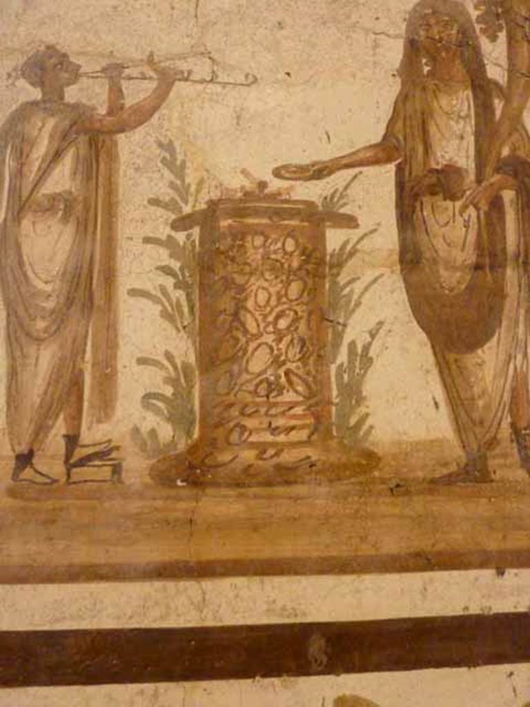 VII.6.38 Pompeii. Detail of round altar on lararium painting. Now in Naples Archaeological Museum. Inventory number: 8905.