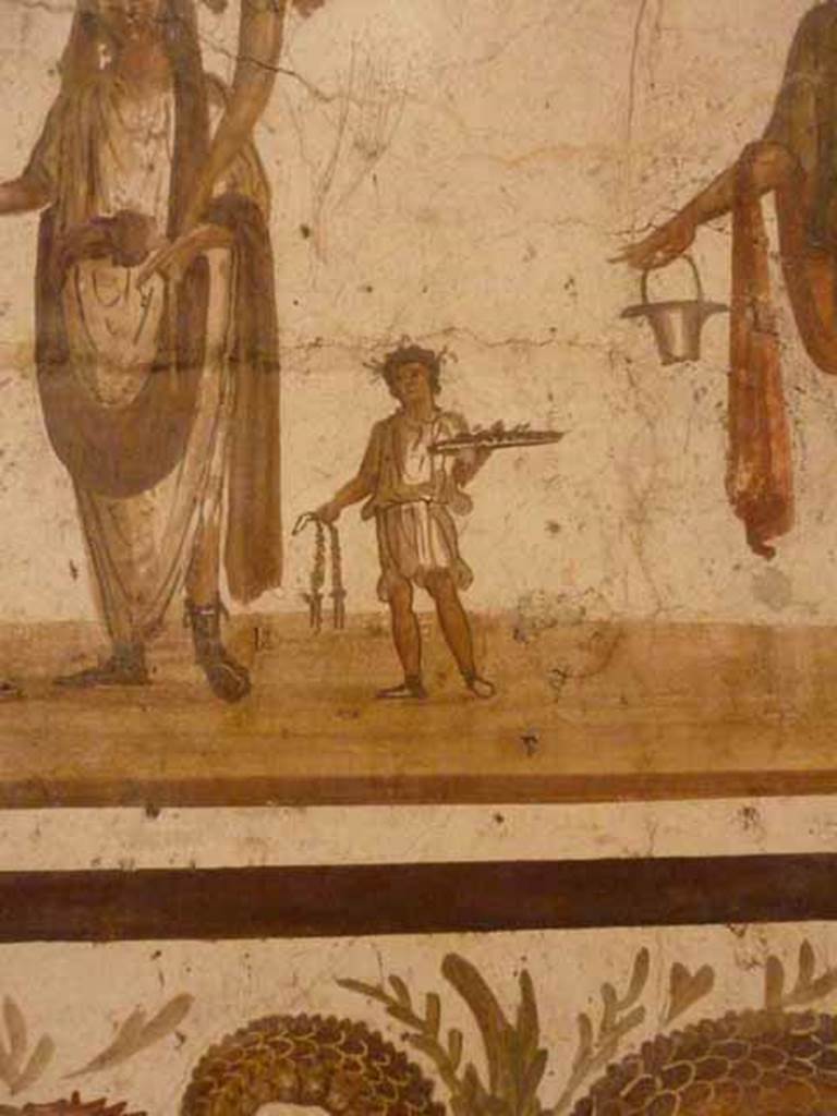 VII.6.38 Pompeii. Detail of priest’s assistant or camillus, shown on lararium painting. Now in Naples Archaeological Museum. Inventory number: 8905.