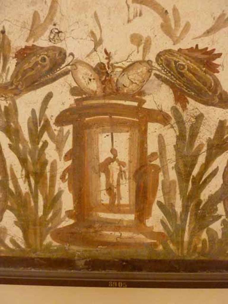 VII.6.38 Pompeii. Detail of altar on lararium painting, shown with eggs placed as offerings on the top. Now in Naples Archaeological Museum. Inventory number: 8905.