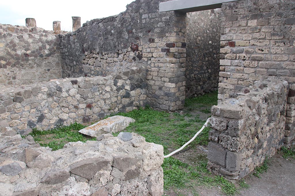 VII.7.2 Pompeii. October 2024. 
Looking south-east from east side of atrium, towards doorway in south wall into room “e”. Photo courtesy of Klaus Heese.