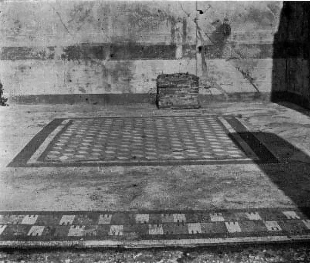 VII.7.5 Pompeii. c.1930. Exedra (u)/tablinum, looking north across flooring.  
According to Blake –
Almost next door to the Apollo temple, in VII.7.5, the tablinum, if such it be, has a similar sectile centre enclosed in simple bands of mosaic. A band of yellow tesserae serves to connect with it, in date, the threshold which employs identical tesserae for its pattern, a textile design suggesting to the Romans a turreted wall.  The background, except for a strip along the back wall, where some large piece of furniture possibly protected the floor from wear, consists of coarser tesserae and probably dates from a later period. (p.38)
In a previous chapter we have mentioned the “turreted border” which formed the threshold of the tablinum of VII.7.5, containing an early sectile centre. Apparently this should be identified as a “textile pattern.” (p.73)
See Blake, M., (1930). The pavements of the Roman Buildings of the Republic and Early Empire. Rome, MAAR, 8, (p. 38 & p.73, & Pl.6, tav.2)