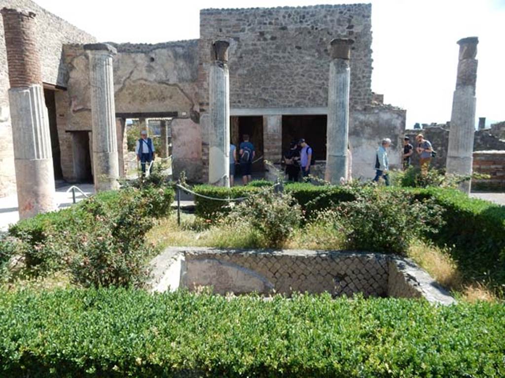 VII.7.5 Pompeii, May 2018. Looking east across peristyle, towards room “n” and remaining north wall of room “m”.
The doorway, second on left, links both houses VII.7.2 and 5 by peristyles. Photo courtesy of Buzz Ferebee.