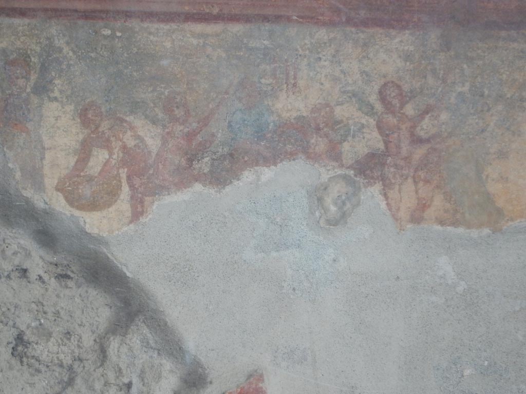 VII.7.5 Pompeii. May 2015. 
Oecus (m) north wall east side of peristyle. Detail of wall painting of cupids making flower garlands. Photo courtesy of Buzz Ferebee.