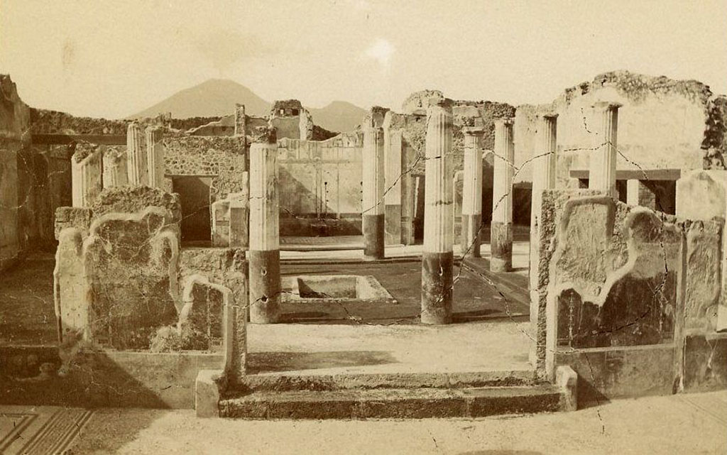 VII.7.5 Pompeii. (circa 1890). Looking north from atrium (b) across peristyle (l) to exedra (u). 
On the left can be seen the north wall and flooring of west ala (e). Photo courtesy of Davide Peluso.
