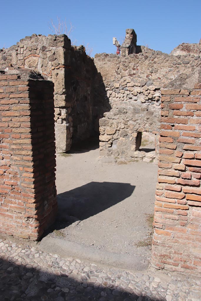 VII.7.8 Pompeii, October 2023. 
Looking north to entrance to steps to upper floor. Photo courtesy of Klaus Heese.