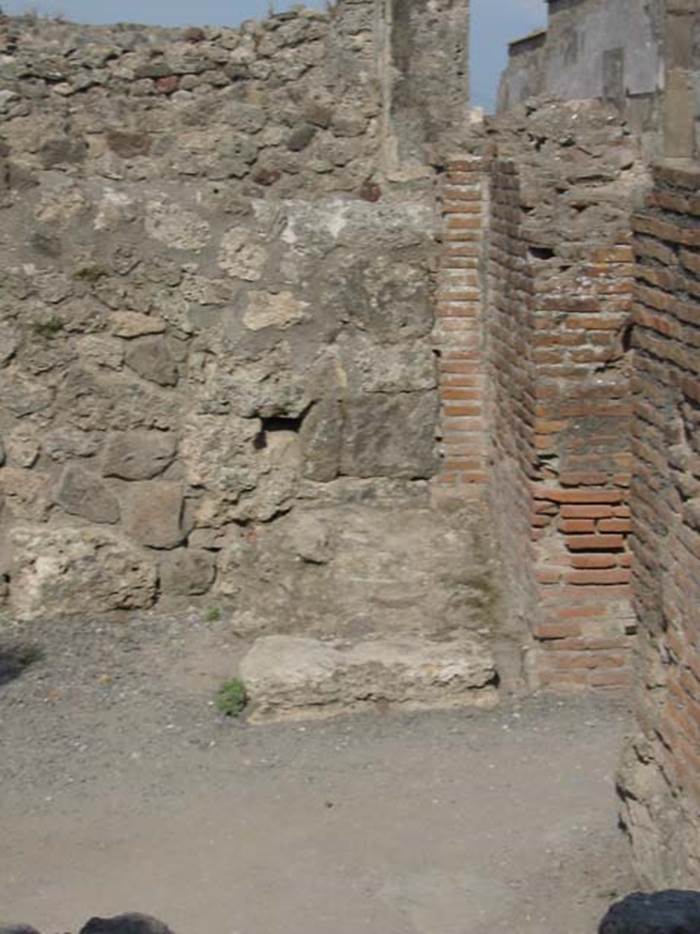 VII.7.9 Pompeii. May 2003. Looking towards the south-east corner of the bar-room. 
Photo courtesy of Nicolas Monteix. According to Eschebach, on the right of the entrance doorway was the hearth.
See Eschebach, L., 1993. Gebäudeverzeichnis und Stadtplan der antiken Stadt Pompeji. Köln: Böhlau.(p.300)