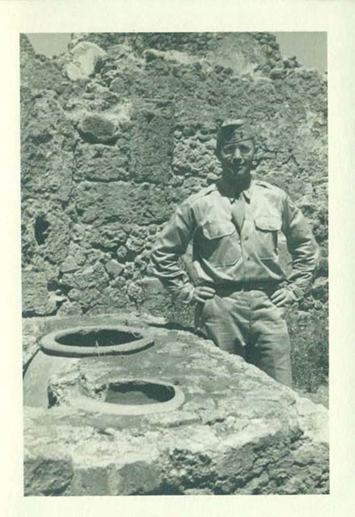 VII.7.9 Pompeii. 1944. Two sided counter, showing two urns. Photo courtesy of Rick Bauer.
