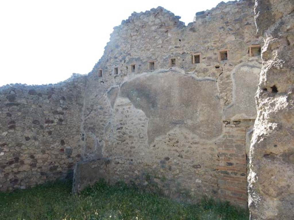 VII.7.10 Pompeii. May 2018. Room (v), looking from doorway towards north-west corner of room, a possible storeroom with latrine. 
In the north-east corner of this room, on right, is the blocked doorway opposite VII.15.1 in Vicolo del Gallo. Photo courtesy of Buzz Ferebee.