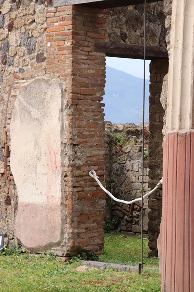 VII.7.13 Pompeii. May 2024. 
Doorway to kitchen area in west wall of peristyle. Photo courtesy of Klaus Heese.