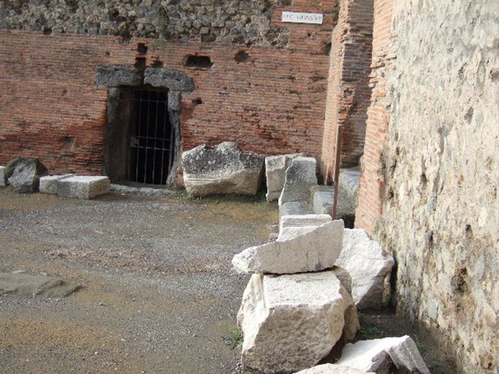 VII.7.27 Pompeii. December 2005. Looking west across north side of forum, towards doorway of VII.7.27.