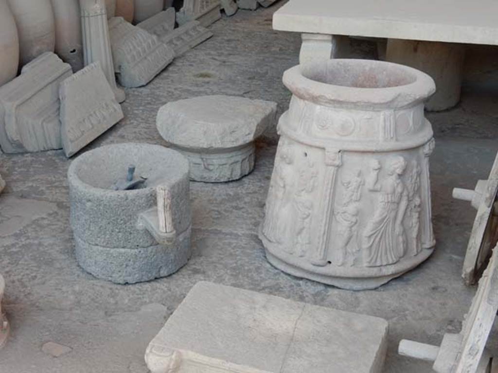 VII.7.29 Pompeii. May 2018. Millstone from VII.16.19-22 House of Fabius Rufus in storage. Photo courtesy of Buzz Ferebee.
PAP inventory number 57645.