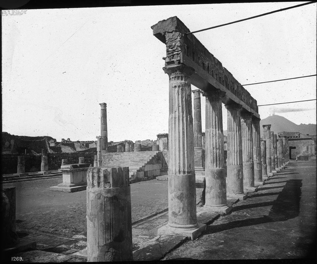 VII.7.32 Pompeii. Looking north-west across Temple of Apollo from near south-east corner.   
Photo by permission of the Institute of Archaeology, University of Oxford. File name instarchbx208im112. Resource ID. 44437.
See photo on University of Oxford HEIR database