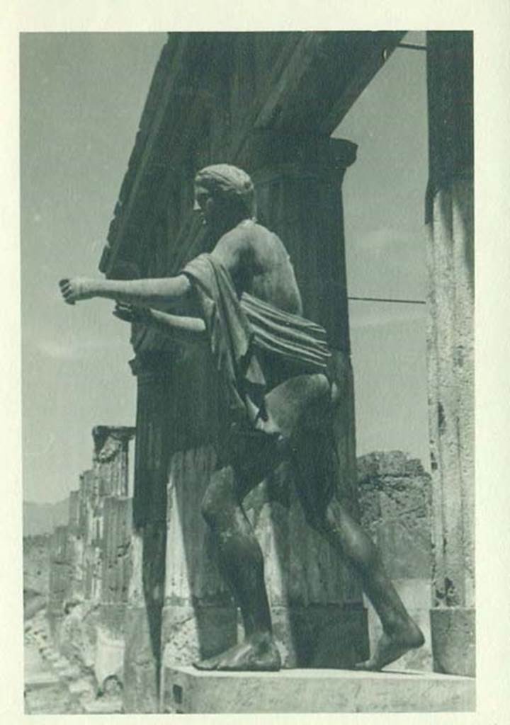 VII.7.32 Pompeii. 1944. Statue of Apollo on east side of Temple of Apollo, in front of the third column. Photo courtesy of Rick Bauer.