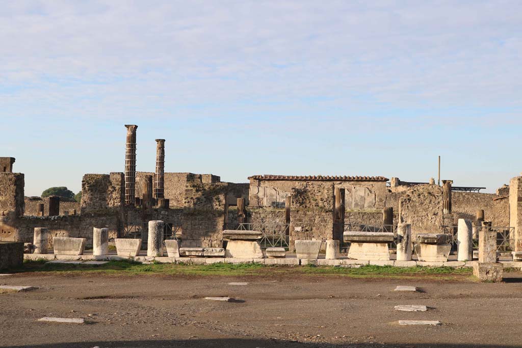 VII.7.32, from VII.8.00, The Forum, Pompeii. December 2018. 
Looking west across Forum towards Temple of Apollo, with doorway on west side, on right. Photo courtesy of Aude Durand.