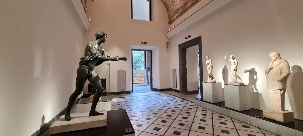 VII.7.32 Pompeii. April 2023. 
Looking along one of the “Campania Romana” galleries in Naples Archaeological Museum. Photo courtesy of Giuseppe Ciaramella.