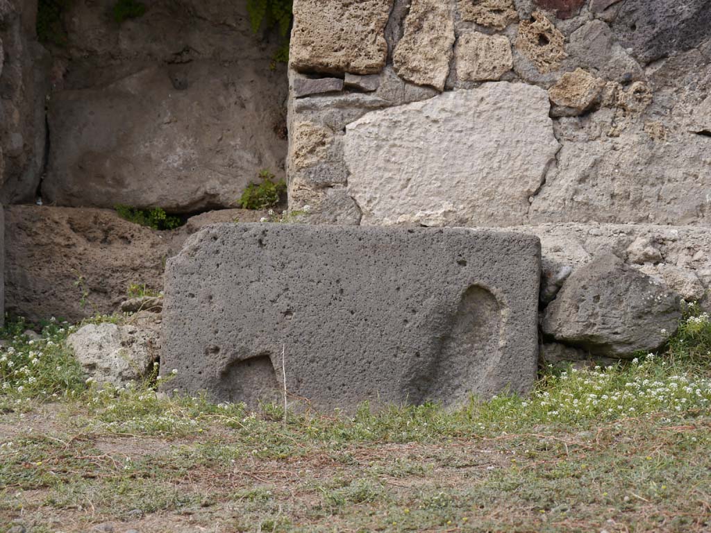 VII.7.32, Pompeii. September 2018. Detail from east side of podium base. 
Foto Anne Kleineberg, ERC Grant 681269 DÉCOR.