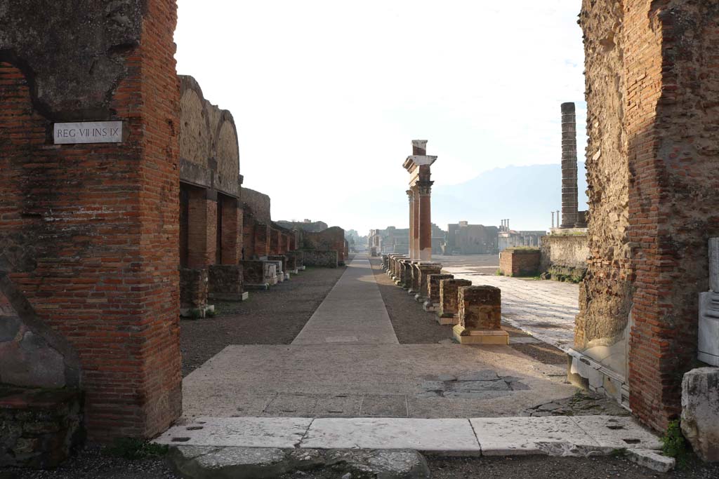 VII.8 Pompeii Forum. December 2018. 
Looking south from east side of Arch, leading across east side of Forum to Via delle Scuole. Photo courtesy of Aude Durand.