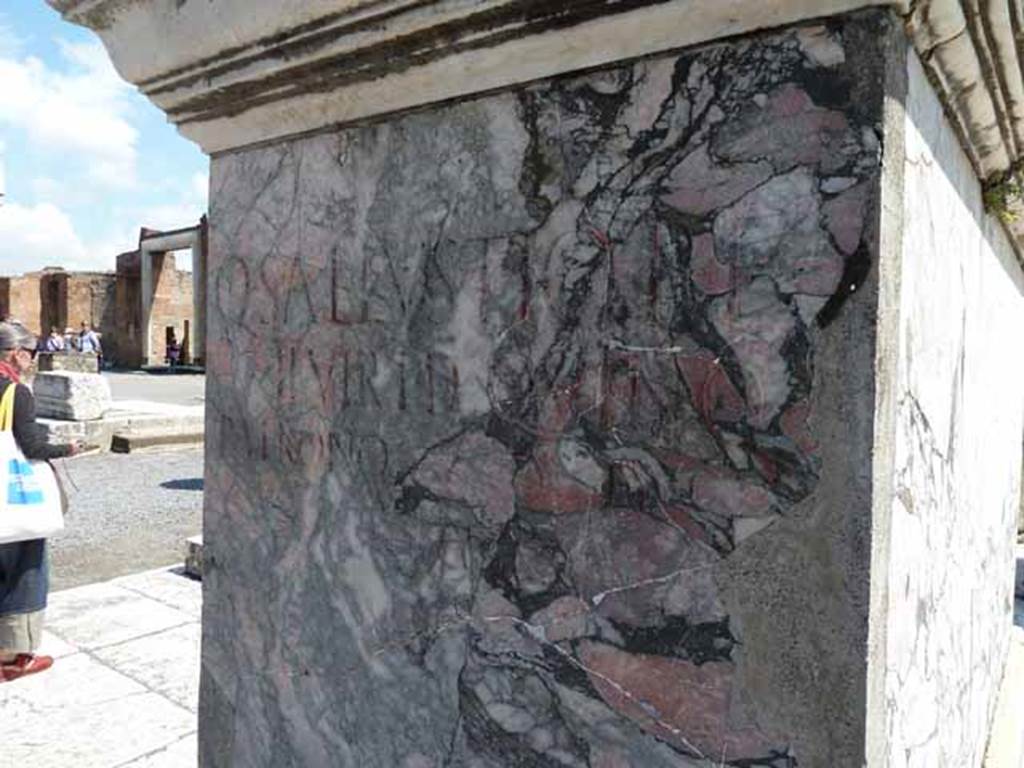 VII.8 Pompeii Forum. May 2010. West side of statue base in south-east corner, with inscription commemorating Quintus Sallustius.