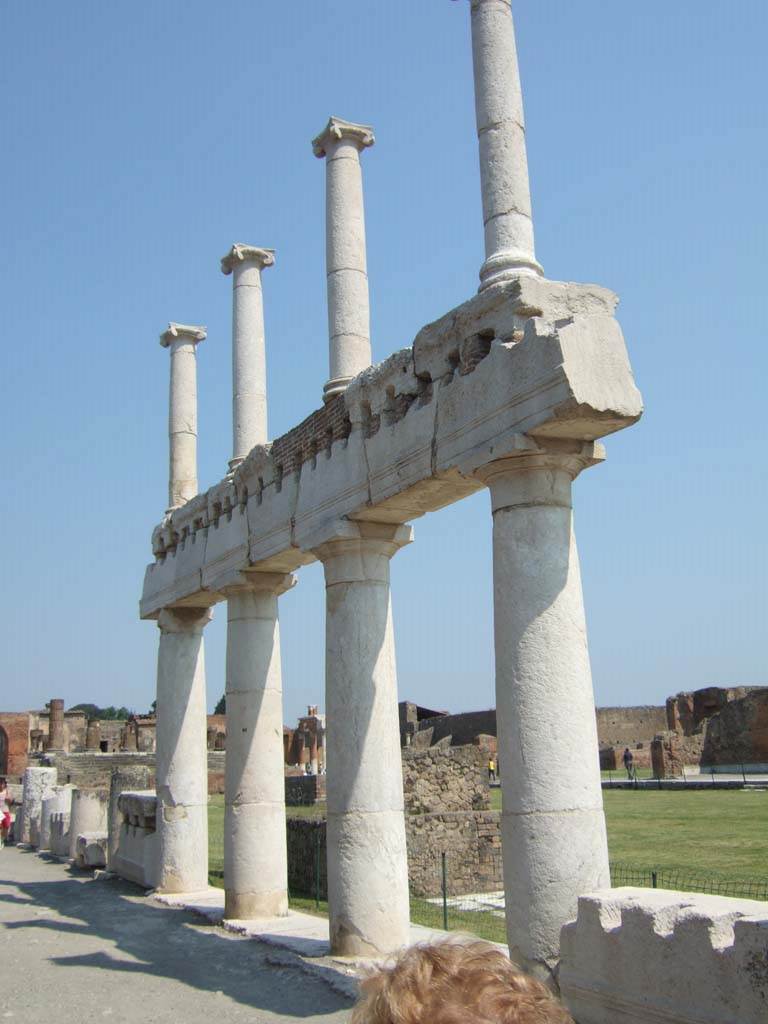 VII.8 Pompeii Forum. May 2006. Two tier colonnade on west side, looking north-east.