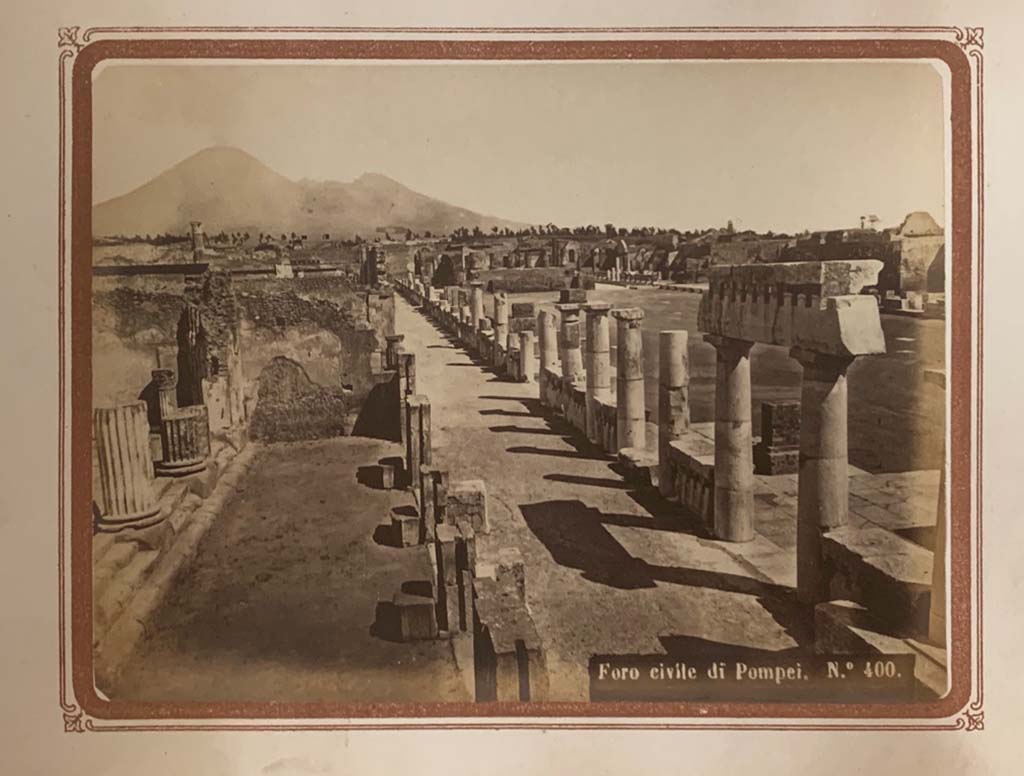 VII.8 Pompeii. Roberto Rive photo numbered 400 from an album dated 1868. 
Looking north along west side, with entrance to Basilica, on left. Photo courtesy of Rick Bauer.